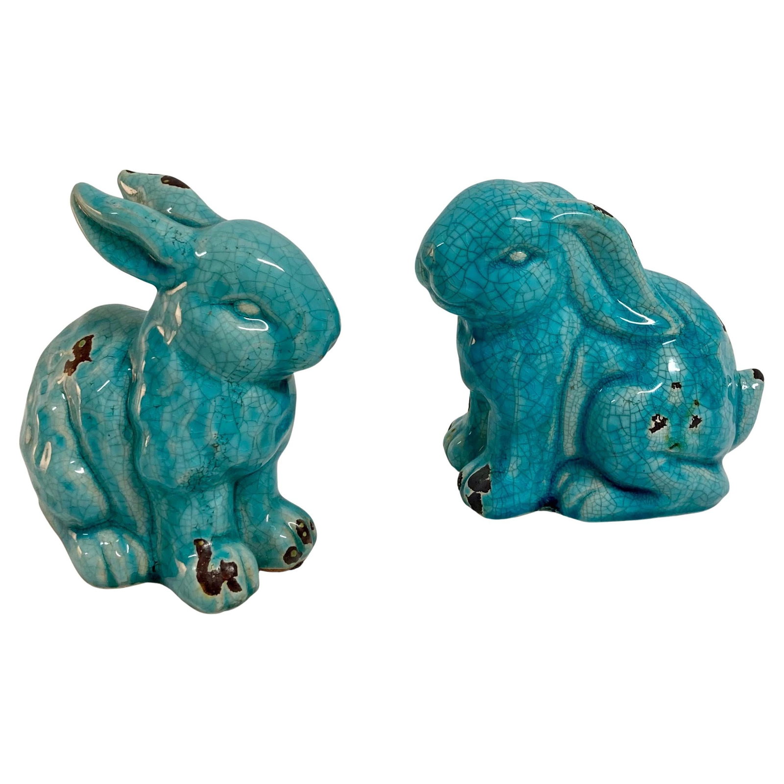 Chinese Turquoise Glazed Bunnies, a Pair: 6"W × 4"D × 6"H 1950s pair of Chinese turquoise glazed terra cotta bunnies. Some imperfections on both, but adds to the character. One has ears down and one has ears up. Add some warmth and characte