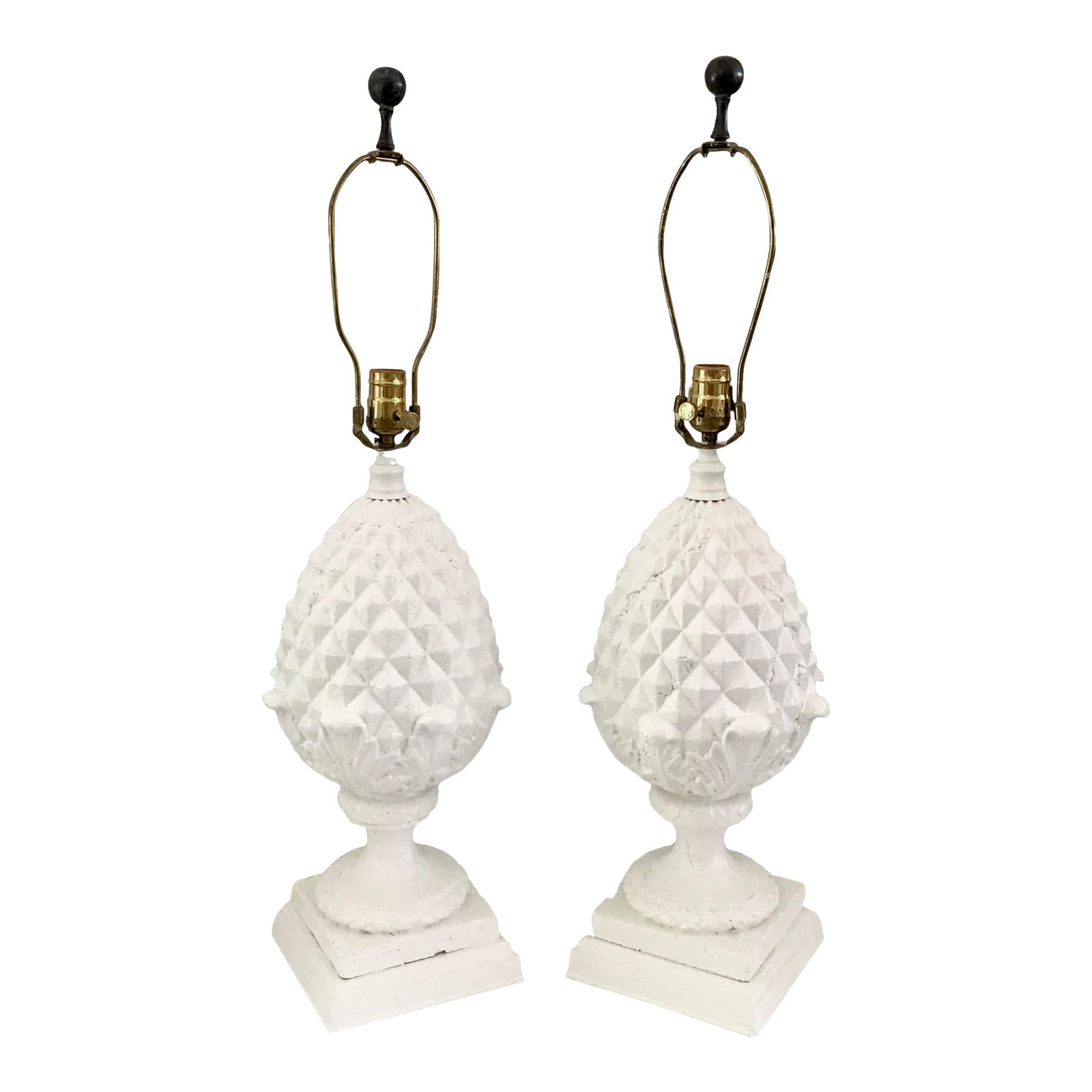 Pineapple Table Lamps in Fresh White Finish, a Pair: 9"W × 9"D × 31.25"L 1960s Hollywood Regency pair of stone pineapple table lamps freshly lacquered in white. Give some character to your table tops with these fun decor lamps. Just add shades of your
