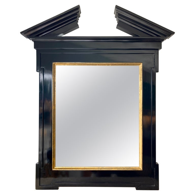 Broken Pediment Mirror by John Hutton for Donghia: 50"W × 5"D × 61"H 1990s modern transitional broken pediment wood mirror by John Hutton for Donghia in custom size and black gloss finish with gilt details. Gorgeous color combination with black and