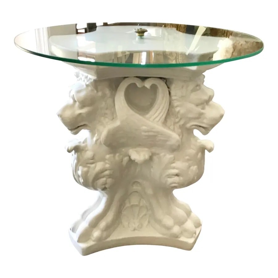 Hollywood Regency Cocktail Table With Griffins Carved Base: 20"W × 20"D × 20"H 1960s Hollywood Regency white cocktail table with a nicely griffins carved base and a glass top. Add this wonderful drink table to your bar or even your studio.