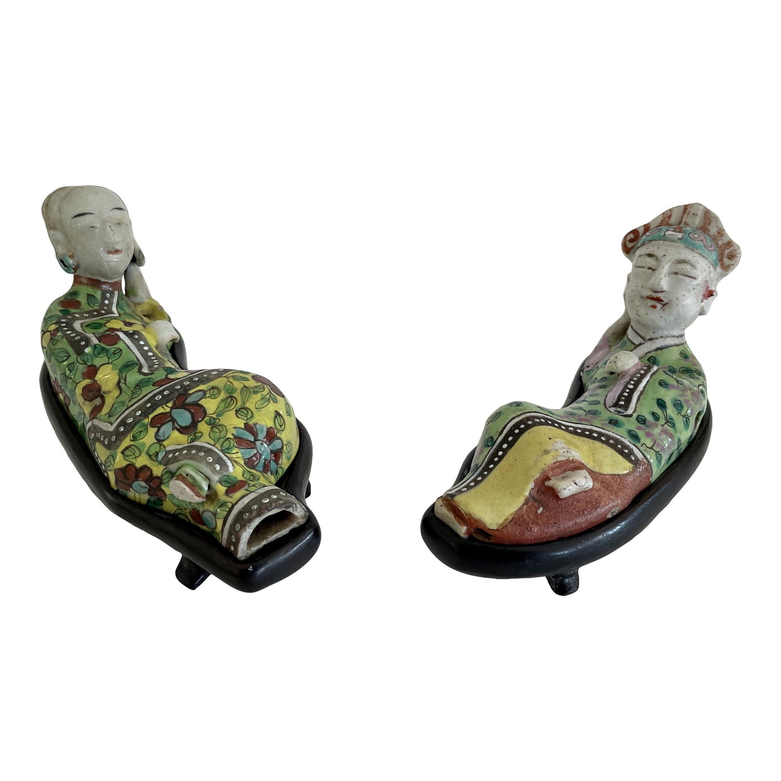 Asian Male and Female Lounging Figurines, a Pair: 7"W × 2.5"D × 3.5"H Early 20th Century pair of antique Asian male and female figurines laying on their beds. Nice ceramic with beautiful colors. Add them to your Asian inspired interiors and table t