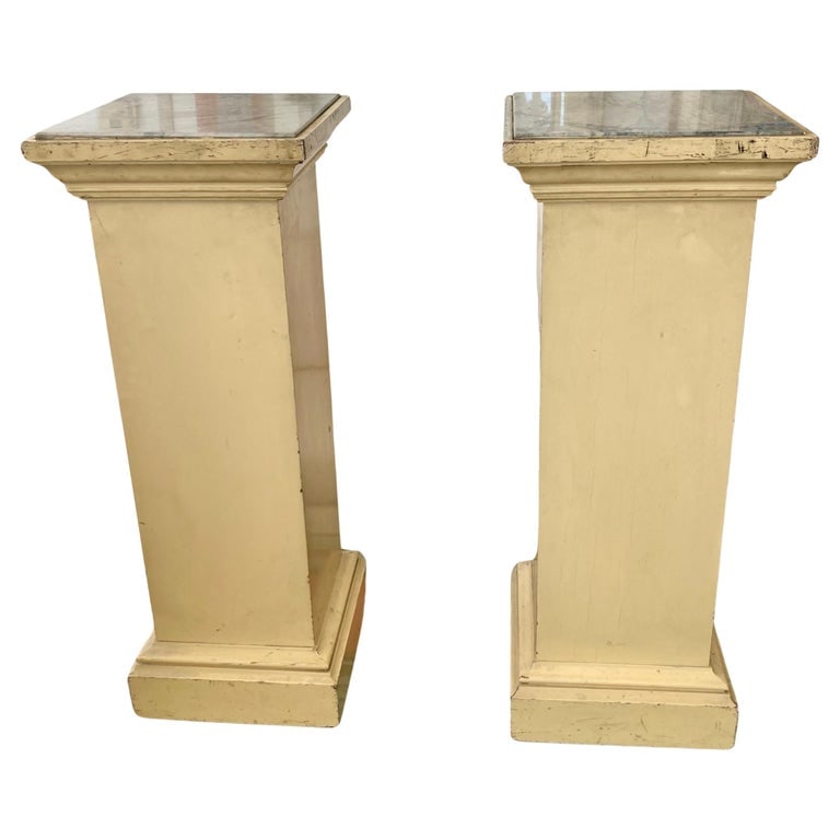 French Pedestals With Marble Tops, a Pair: 14"W × 14"D × 36"H 1940s pair of French traditional wood pedestals with marble tops. Great addition to your architectural French inspired home and interiors. Made in France.
