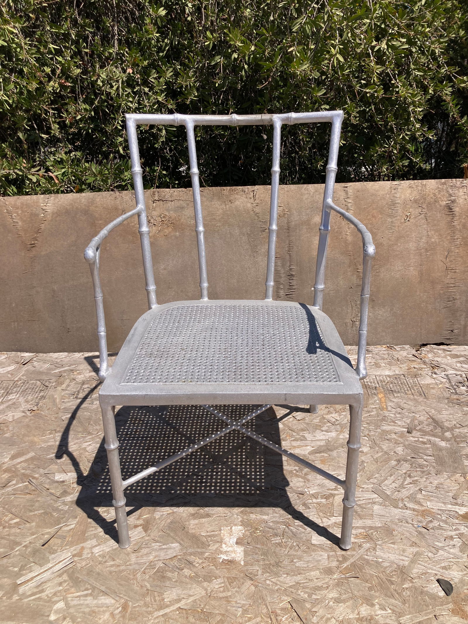 Michael Taylor Bamboo Arm Chair: 22"W x 23"D x 32"H Michael Taylor Designed Bamboo Arm Chair alluminum frame ready to be finished and upholstered. Pick up address Perris, CA 92570.