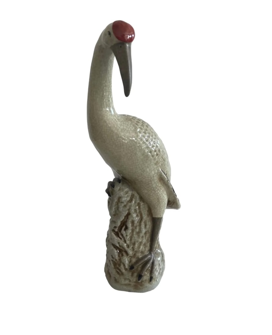Asian Tropical Bird In Glazed Porcelain: 8"W x 5"D x 17"H Asian Tropical Bird in Glazed Porcealin. Great details and unusual colors.