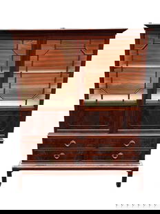 Antique English George lll Mahogany Cabinet: Elegant upper glass double doors with fine symmetrical fretwork reveal a display shelf, interior line and cream color silk fabric. The front of the cabinet is done in brilliant flamed mahogany. This b