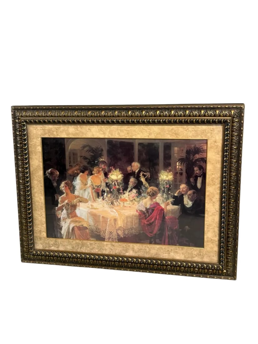 Large Scale Victorian-Era Dinner Party Scene Framed Art Print: This beautifully framed artwork features an elegant Victorian-era ?dinner party? scene in the style of Jules Alexandre Grun with rich, romantic brushwork and warm interior lighting. Though the exact a