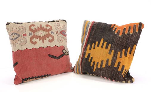 Woven Kilim Rug Decorative Throw Pillows: A pair of decorative woven Kilim rug style pillows. Measures: 13” square each.