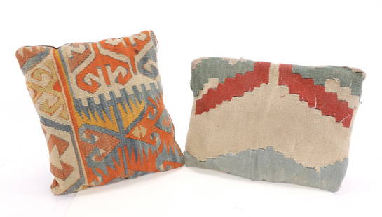 Woven Kilim Rug Decorative Pillows Group: A pair of decorative woven Kilim carpet style pillows. Dimensions: H:15.5” x L: 11” and H: 12” x L: 14”
