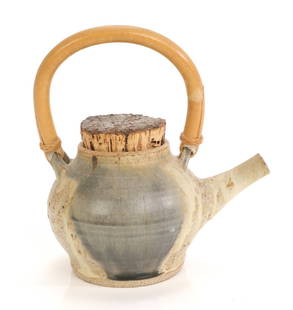 P. SASBERG Studio Art Pottery Teapot: A studio art pottery teapot with large cork stopper/ lid. Signed on base “P. Sasberg”(?) Dimensions: H: 8” (with handle) x L: 3.75” X W: 3.75".