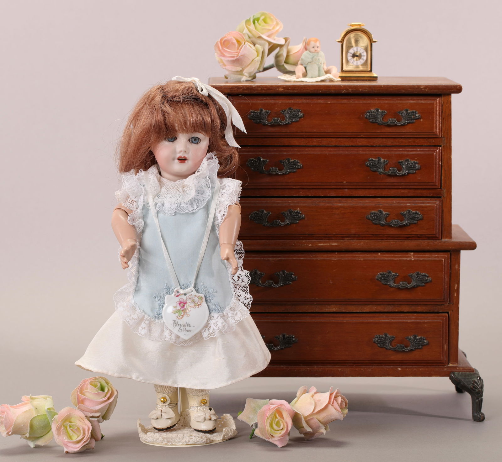 BLEUETTE SILVER BISQUE DOLL ARTIST MADE THU-TAM FREEMAN 11": Maker: Bleuette Silver SFBJ Artist: reproduction doll made by artist Thu-Tam Freeman. Materials: She has a bisque head, Seeley body, real human hair wig, open mouth. Comes with clothing pictured. Mark