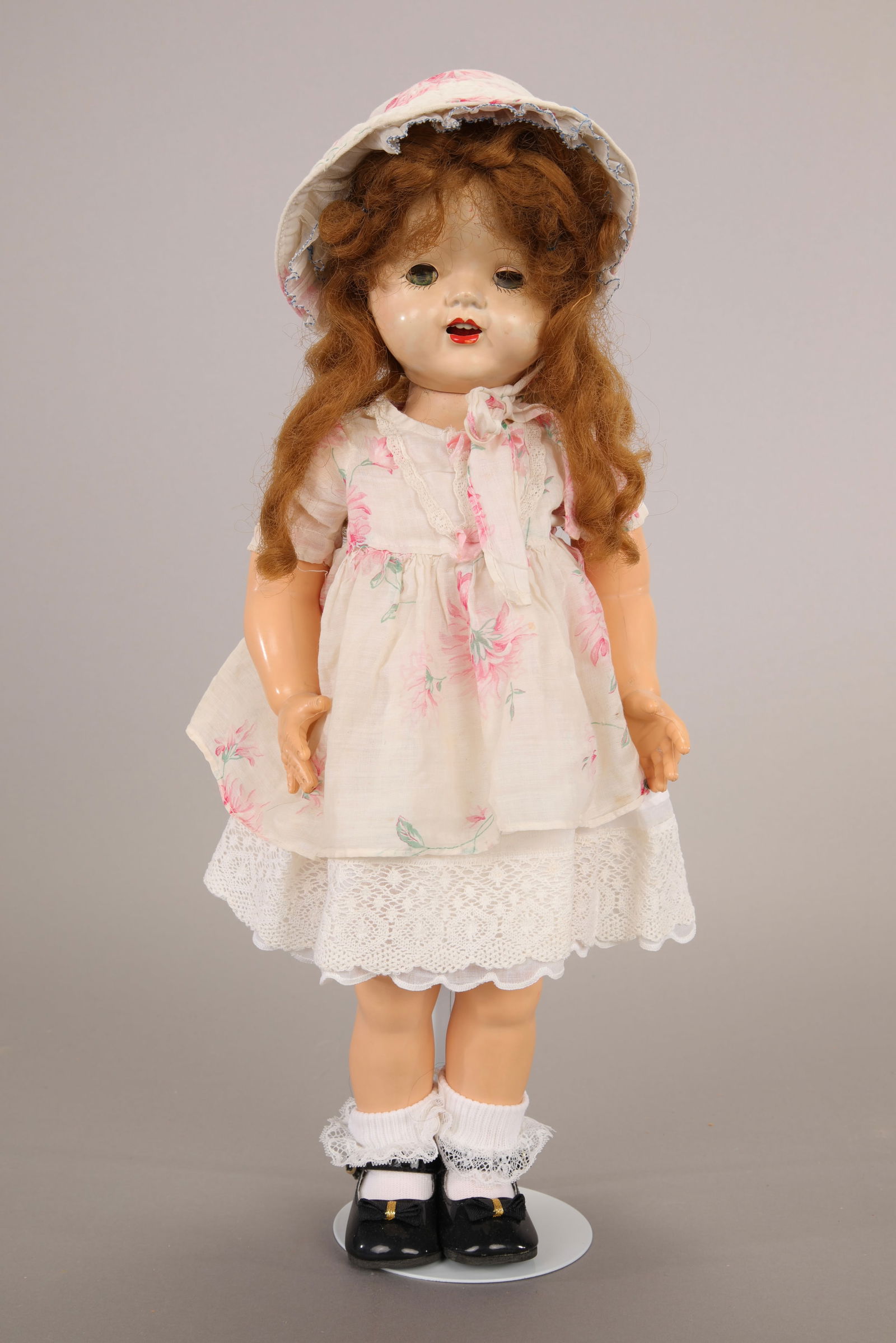 IMPERIAL CROWN PATTY LYNN WALKER VTG 1950S HARD PLASTIC DOLL: Maker: Imperial Crown Marks: Impco Size: 19" Materials: hard plastic with speaker in torso (not working?), her head is loose, sleepy eyes (cloudy), open mouth with 4 teeth, long auburn hair. Age: 1930