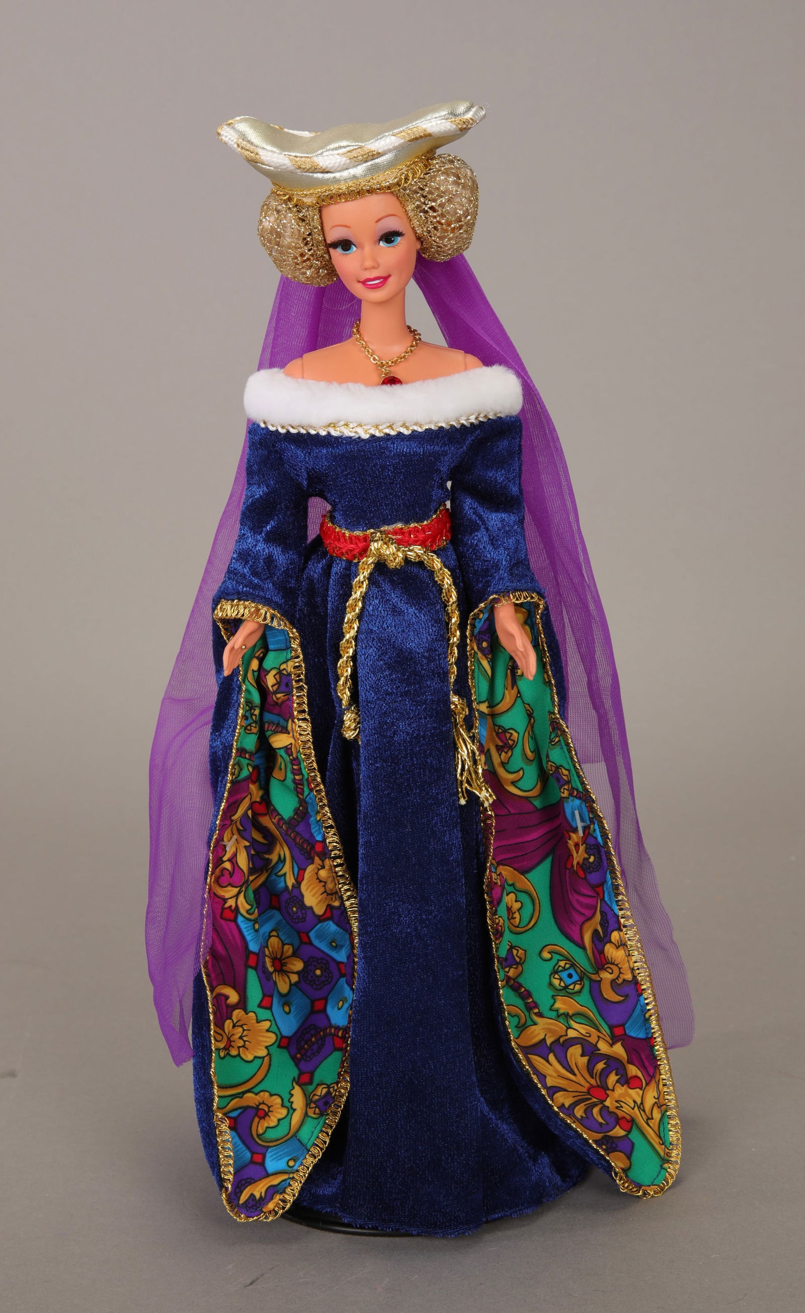MEDIEVAL LADY BARBIE DOLL GREAT ERAS COLLECTION: A Medieval Lady Barbie Doll from the Great Eras Collection. The doll is dressed in traditional clothing from the Late/ High medieval period and comes with her stand. Made by Mattel. 11.5" Tall.