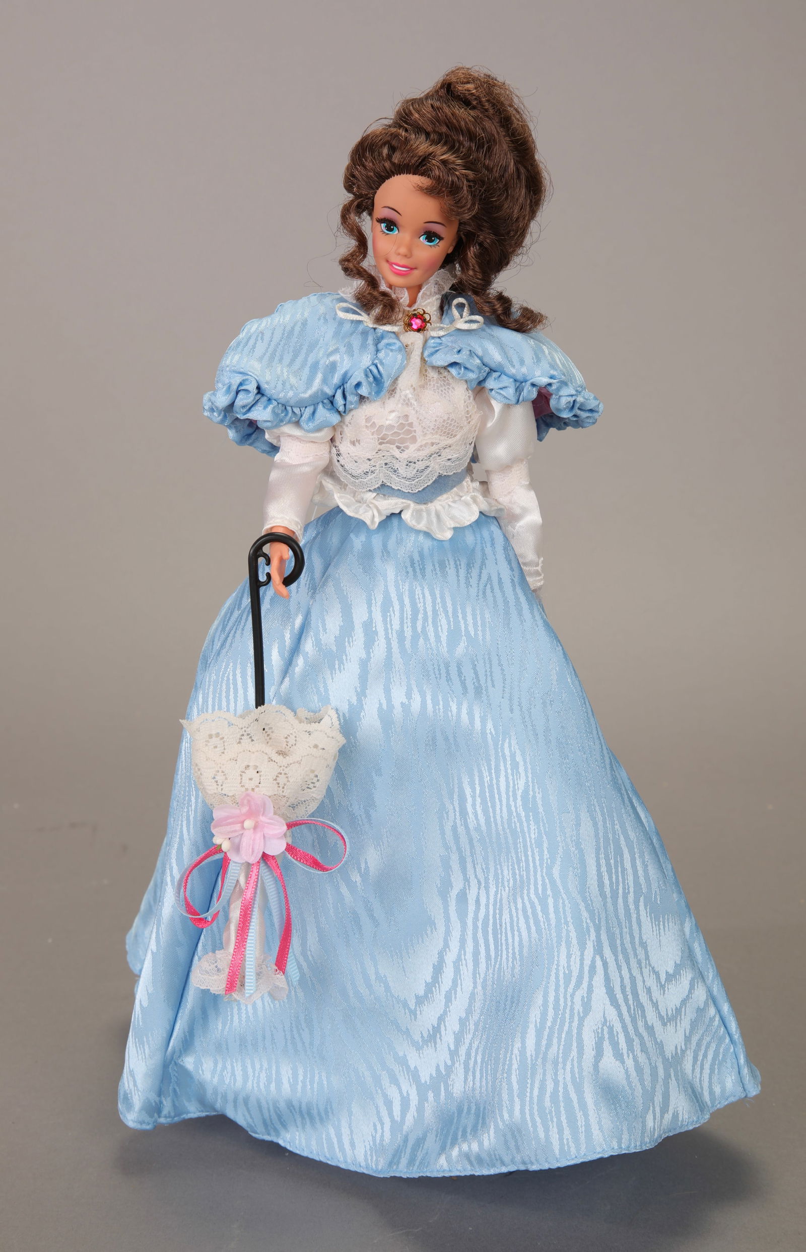 GIBSON GIRL BARBIE DOLL GREAT ERAS COLLECTION: A Gibson Girl Barbie Doll from the Great Eras Collection. The doll is dressed in traditional Edwradian clothing and comes with her stand. Made by Mattel. 11.5" Tall.