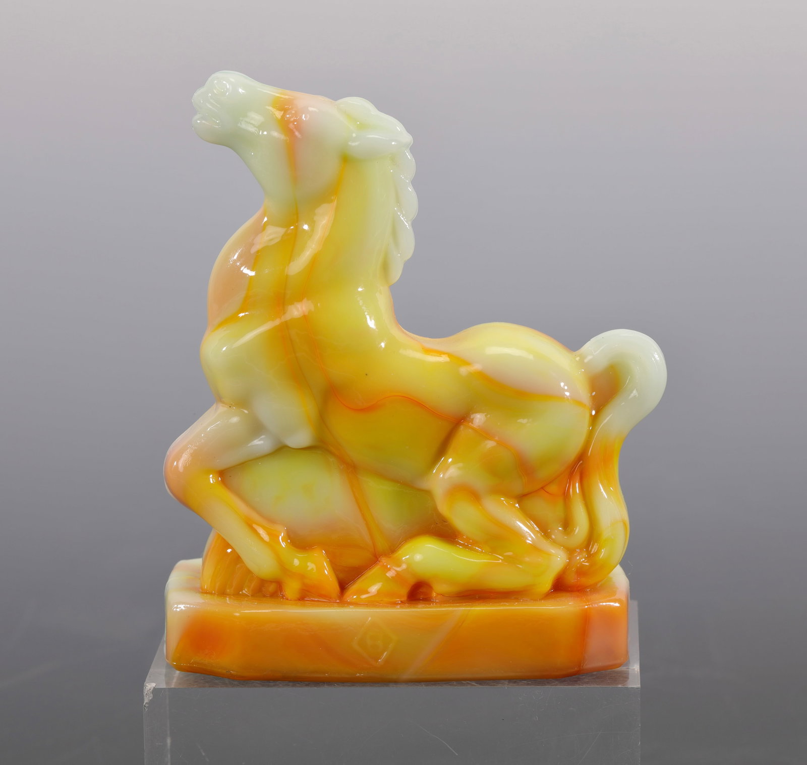 BOYD JOEY THE HORSE SLAG GLASS FIGURINE PAPERWEIGHT CADMIUM GLOW: A Joey the Horse swirled slag glass figurine. It is made by Boyd Glass and glows orange under a UV light due to the Cadmium content in the glass. Measures: 4"H x 3"W INV#-Bright Pink 56/ COL-3126
