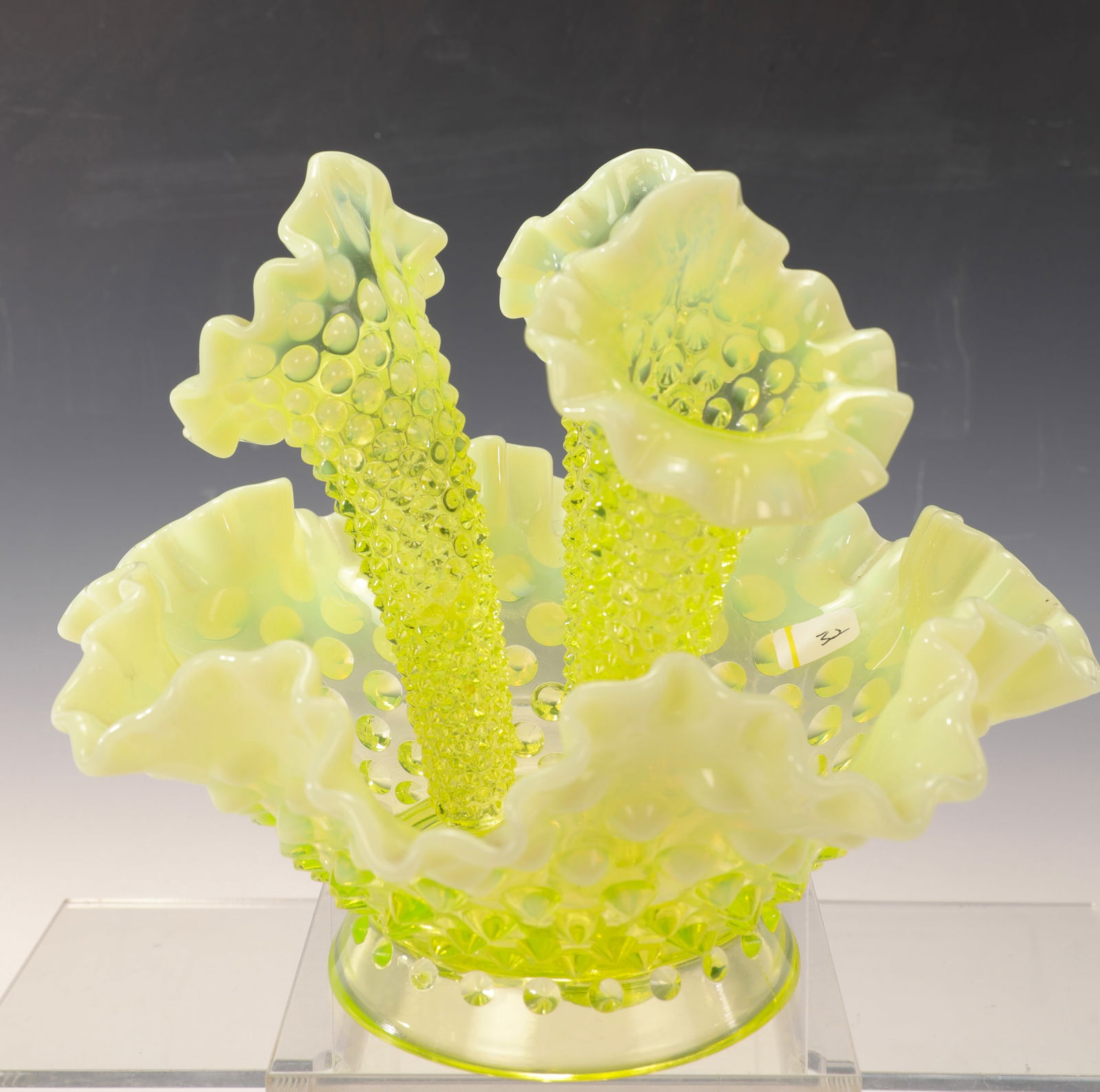 FENTON TOPAZ OPALESCENT VASELINE GLASS HOBNAIL 3 HORN EPERGNE: A Fenton topaz opalescent vaseline glass hobnail three horn epergne. It is a four-piece set, including a ruffled bowl base and three removable horns (vases). Made of hand-blown opalescent glass in a v