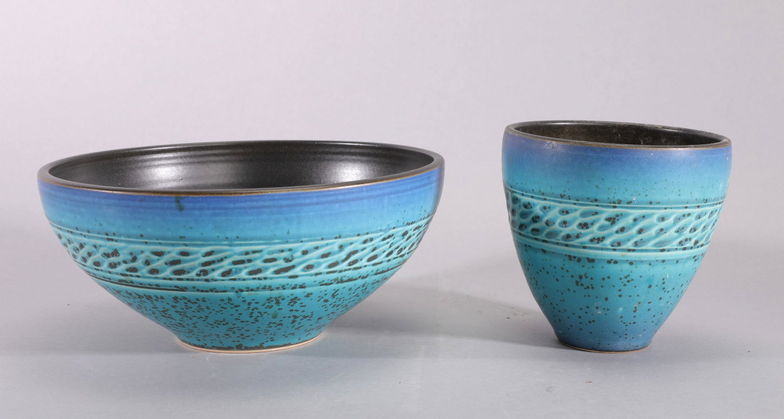 PAUL JESELSKIS PAIR OF STUDIO ART POTTERY VESSELS: Paul Jeselskis Ceramic Studio Art Pottery Bowl & Vase Lot Description This beautiful two-piece lot features contemporary studio art pottery crafted by master ceramicist Paul Jeselskis. The collection 