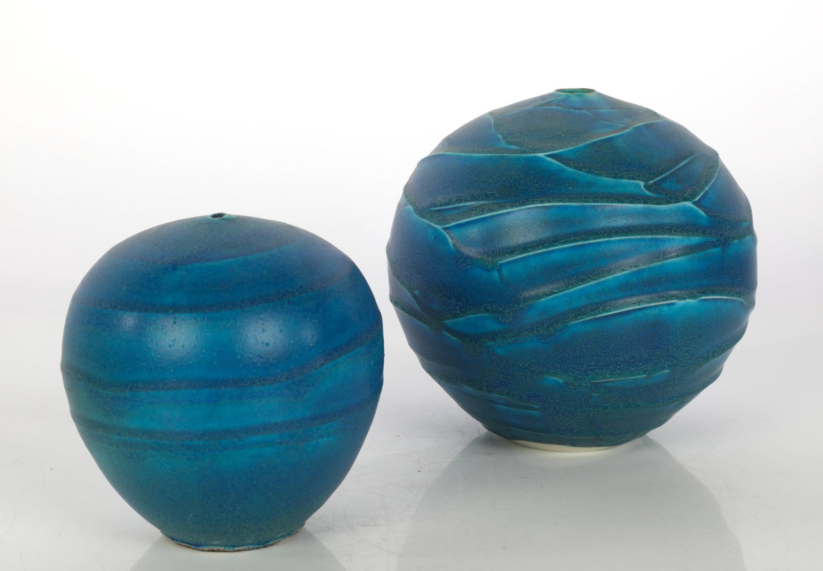 NICHOLAS BERNARD PAIR OF STUDIO ART POTTERY SCULPTURAL VASES: Pair of Nicholas Bernard Studio Art Pottery Vases An elegant offering of two contemporary studio art pottery vases by acclaimed American ceramic artist Nicholas (Nick) Bernard. This pair features beau