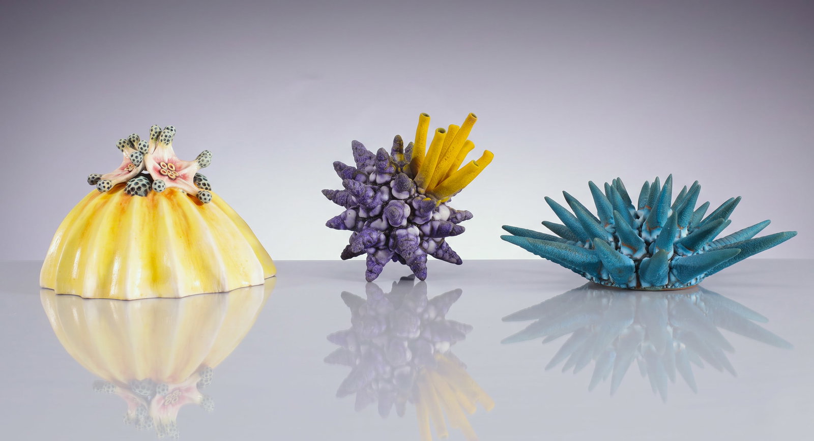 BETH GARCIA & WILLIAM KIDD TRIO OF BOTANICAL-MARINE POP ART SCULPTURES: This auction features an extraordinary three-piece lot of contemporary biomorphic studio art pottery, highlighting the highly imaginative works of ceramic artists Beth Garcia and William Kidd. Taking 