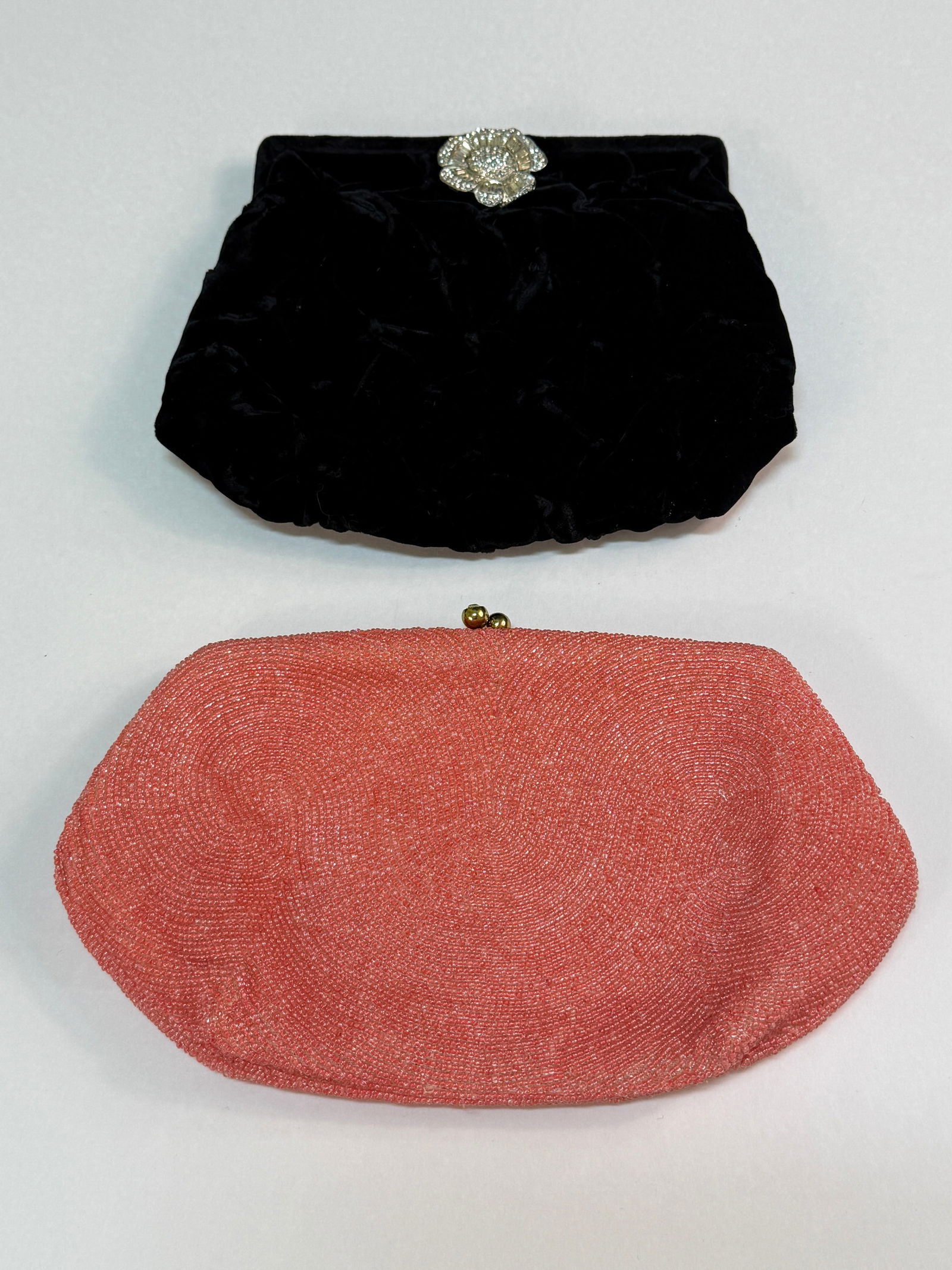 Group of 2 Vintage Evening Bags Beaded Velvet Rhinestone & Walborg: From an upstate, NY estate collection. Pair of vintage handbags. One is black silk velvet, with broken / detached floral rinestone latch. Other is pink glass beaded, with Walborg Original tag. At larg