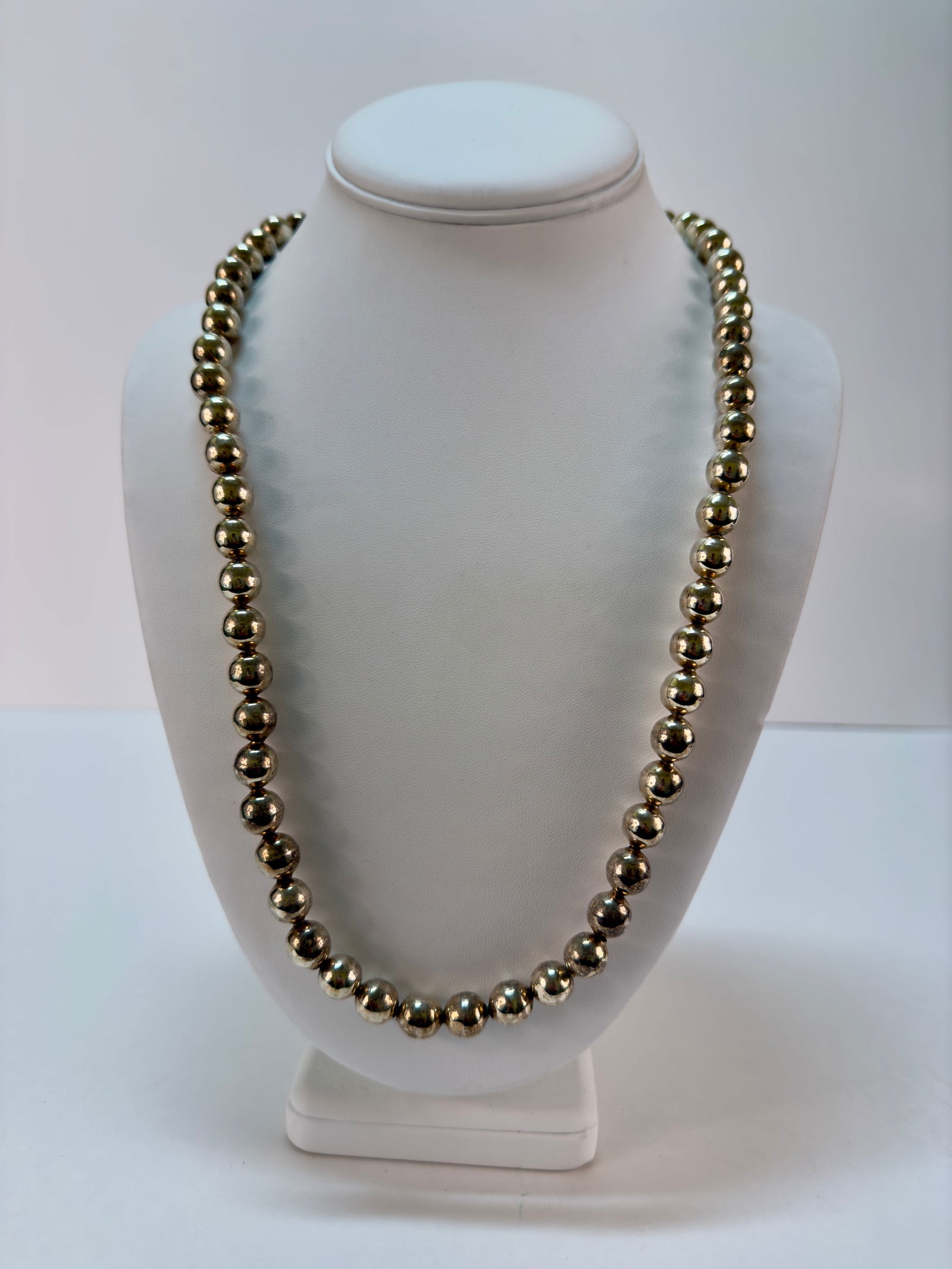 Long Taxco Sterling Silver Beaded Necklace 25.75": From an upstate, NY estate collection. Heavy modern sterling silver Taxco Mexico round beaded necklace. Box clasp partially marked Mexico. Tested Sterling Silver. Round beads, each measuring approx 9.