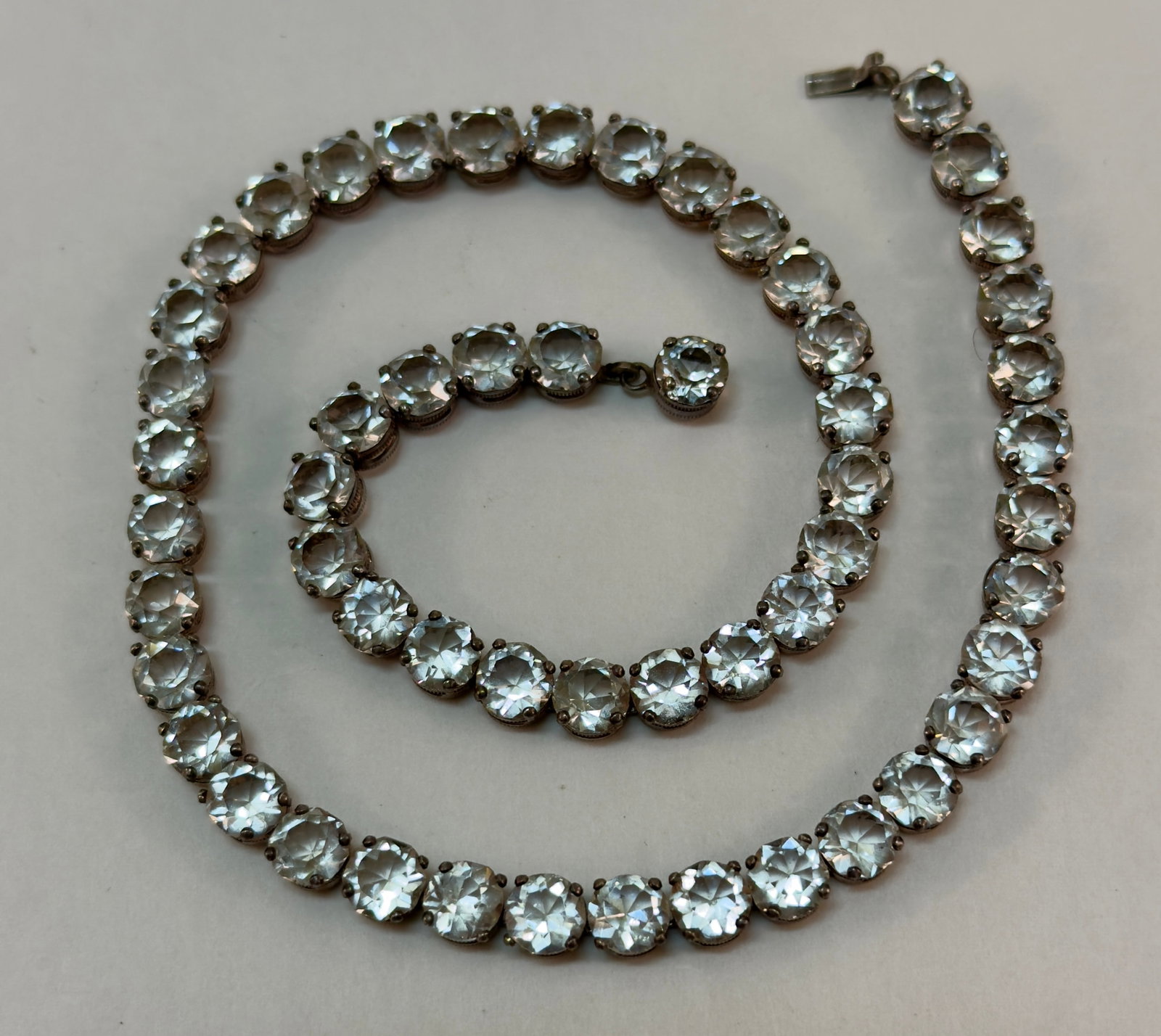 Art Deco Era Sterling Silver Paste Tennis Style Necklace Choker: From an upstate, NY estate collection. Classic vintage Art Deco sterling silver & paste stones tennis style necklace / choker. Marked. Box clasp. Measures approx 14" long with stones measuring approx
