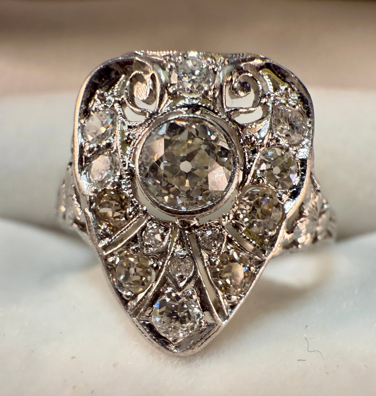Antique Art Deco Platinum Diamond Ring: From an upstate, NY estate. Stunning Art Deco era diamond ring, set with old mine cut diamonds. Fashioned in platinum, ring size 11.5. Center round old mine cut diamond weighing approx .4 ct with SI1 