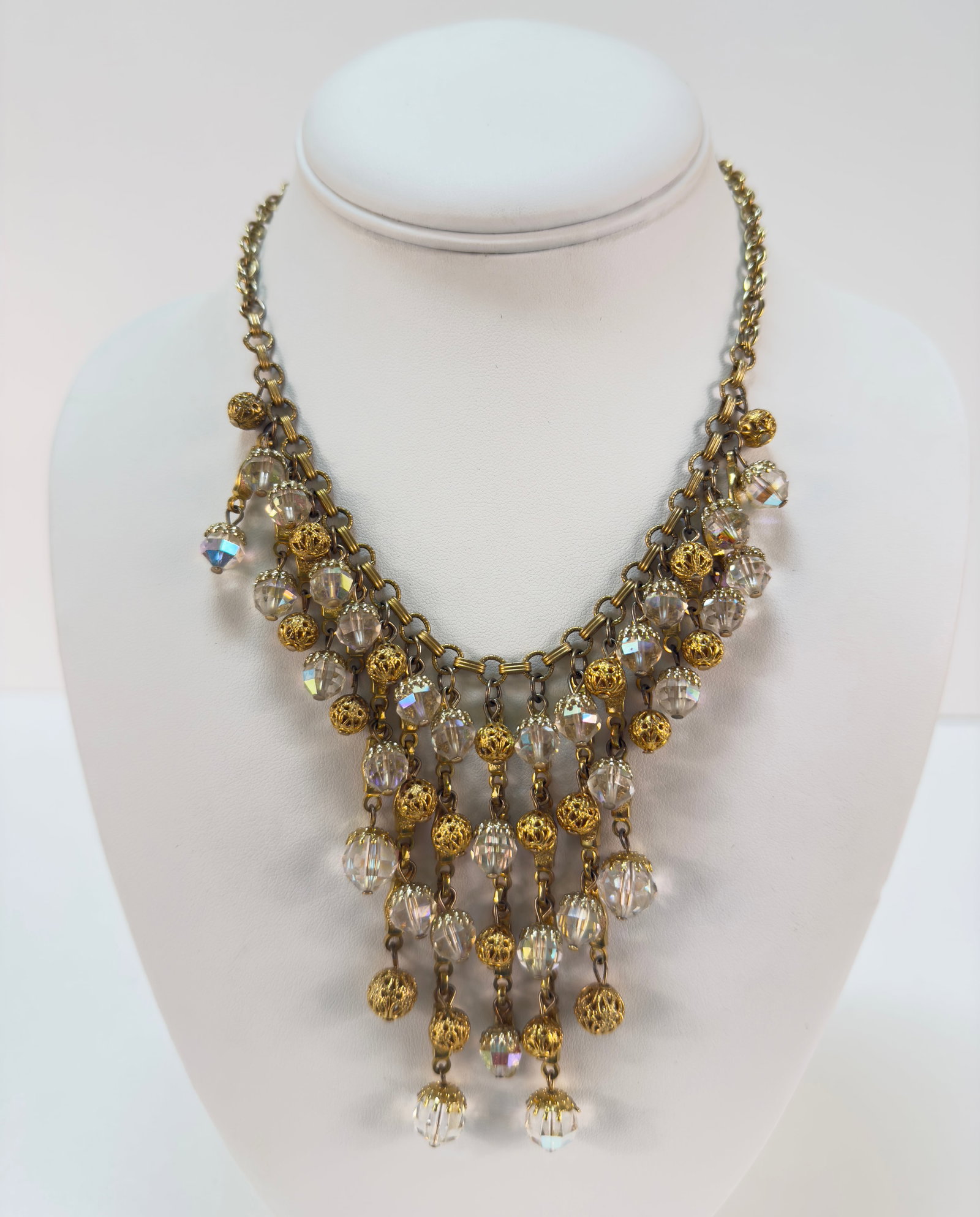 Gorgeous 1960s Gold Tone Austrian Crystal Chandelier Necklace: From an upstate NY collection. Fabulous Austrian crystal chandelier necklace in 1960s style gold tone. Unsigned. Measures approx 16" long.