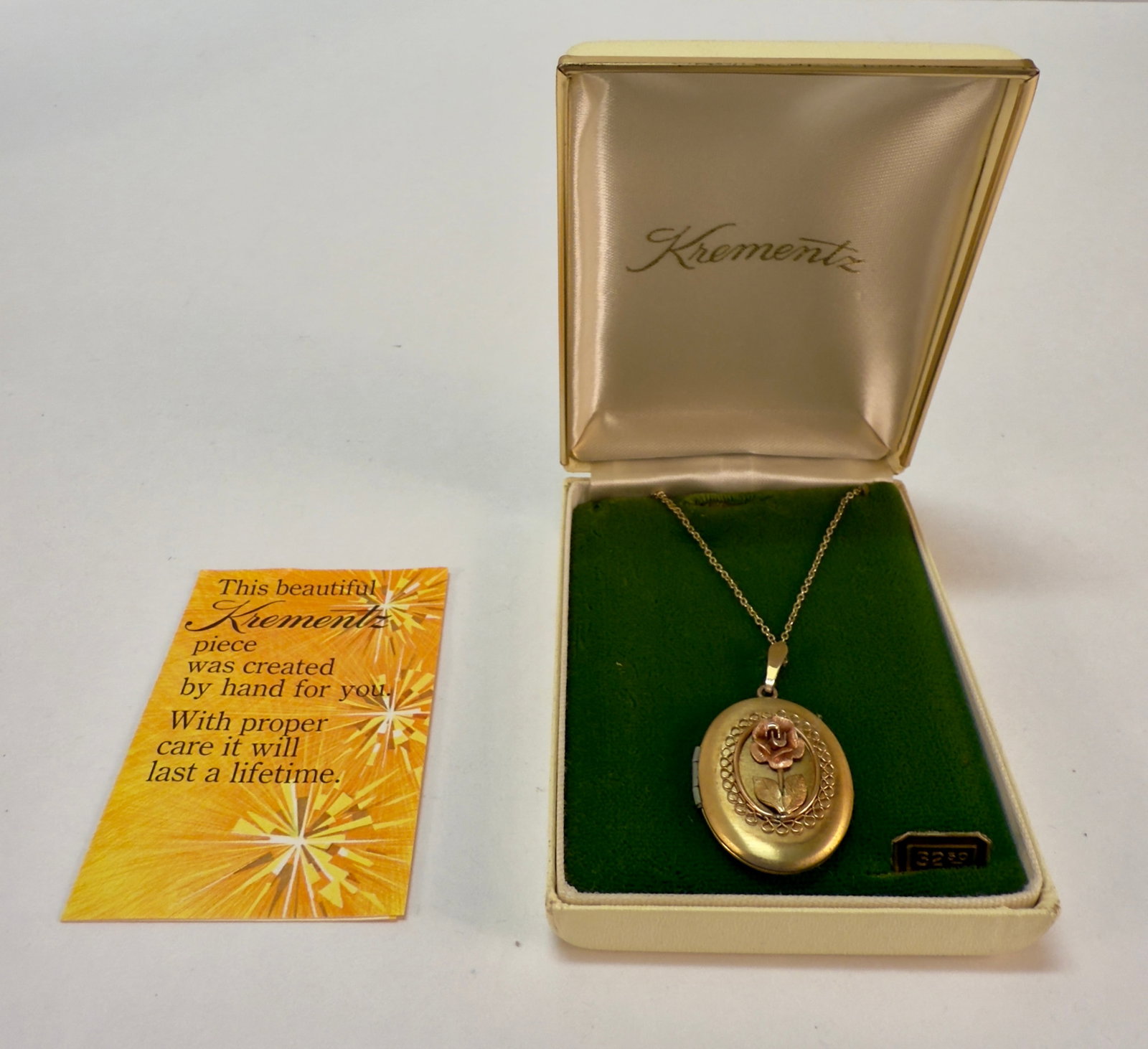 Sweet Vintage Krementz Gold Filled Rose Locket Original Box: From an upstate, NY estagolfte collection. Classic and sweet vintage Krementz gold filled locket and chain with original box and materials. Tri-tone gold with rose design. Locket measures approx 1.125