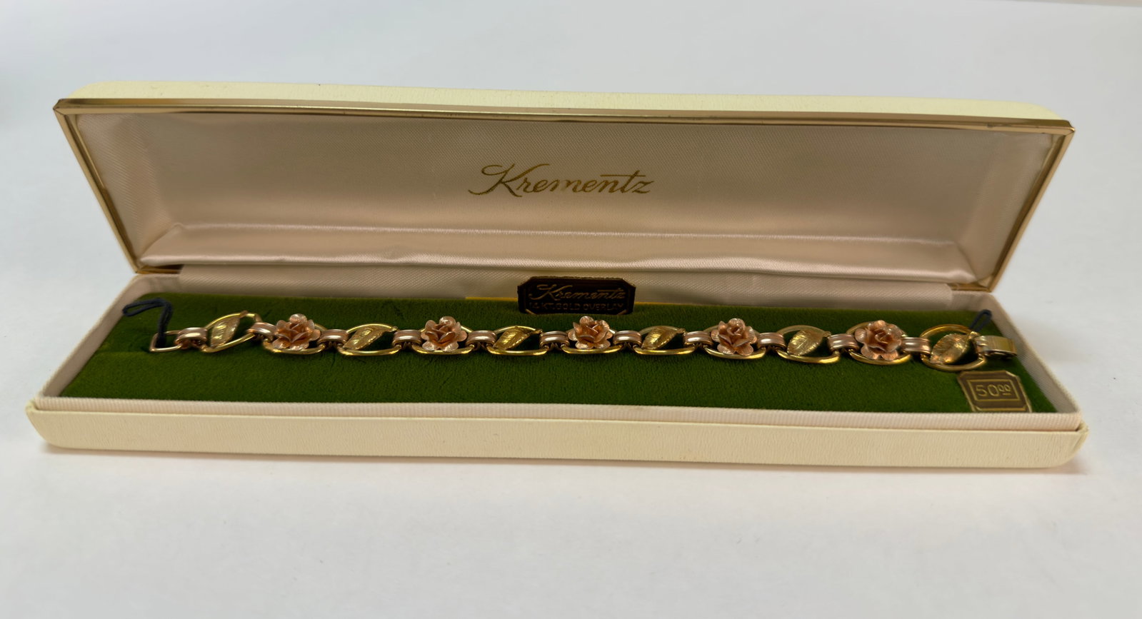 Sweet Vintage Krementz Gold Filled Rose Bracelet Original Box: From an upstate, NY estate collection. Classic and sweet vintage Krementz gold filled bracelet with original box and materials. Tri-tone gold with rose design. Bracelet measures approx 7.5" x .375" wi