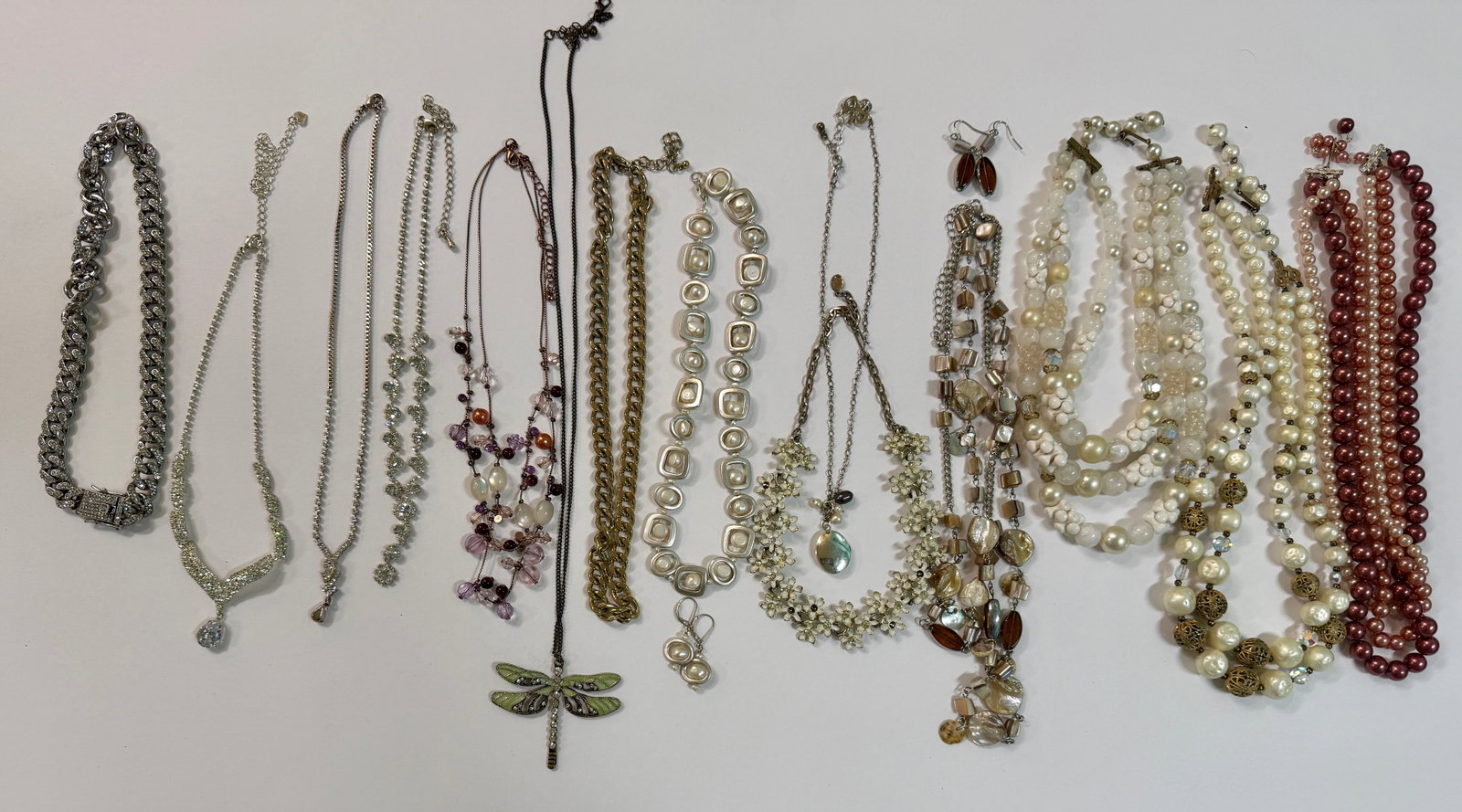 Large Group of 1990s Y2K Vintage & Contemporary Necklaces: From an upstate, NY estate. Large group of various costume jewelry necklaces, dating from the 1990s to the contemporary. Some formal wear / sparkling rhinestone pieces included.