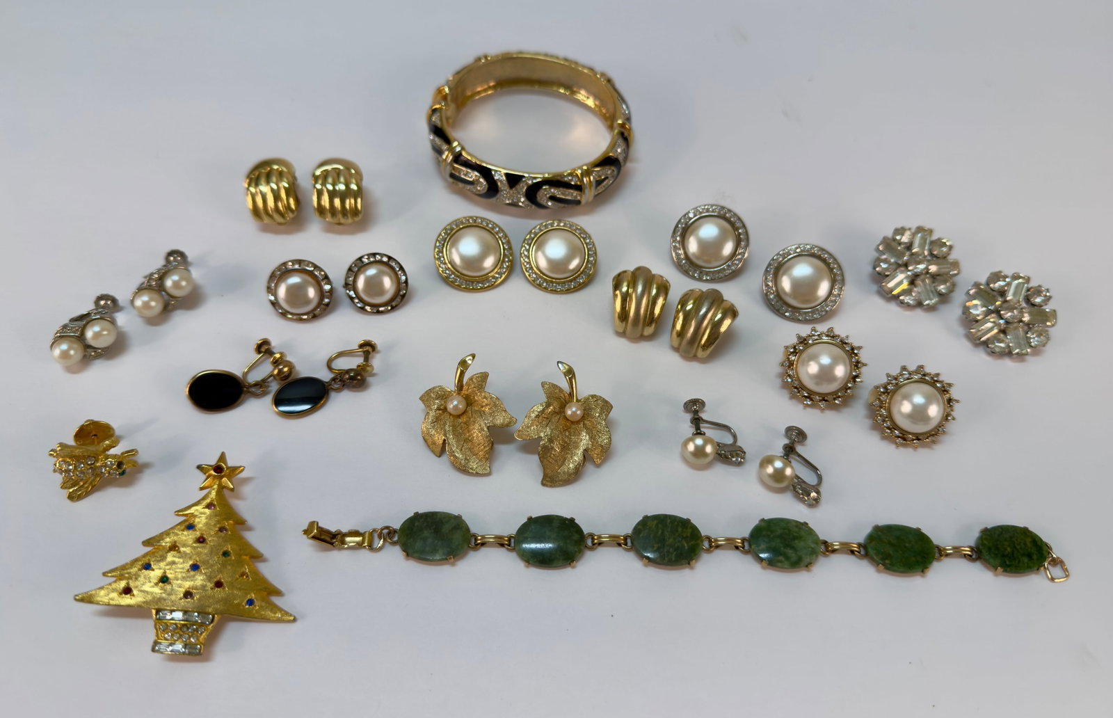 Large Group of Vintage Costume Jewelry Pins Brooches Bracelets & Clip On Earrings: From an upstate, NY estate. Large group of various costume jewelry pieces, including brooches / pins, bracelets, and sets of clip on earrings (some marked.) Ranging in age from the 1960s - 1990s.