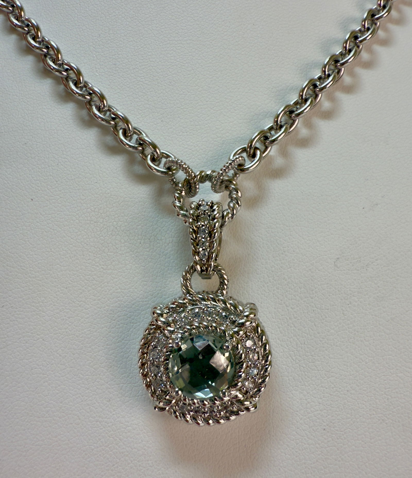 Sterling Silver & Topaz Pendant Necklace by Designer Judith Ripka: From an upstate, NY estate. Sterling silver and topaz pendant necklace designed by Judith Ripka. Marked. Discontinued design. Necklace measures approx 18" long. Weighs approx 35 grams.