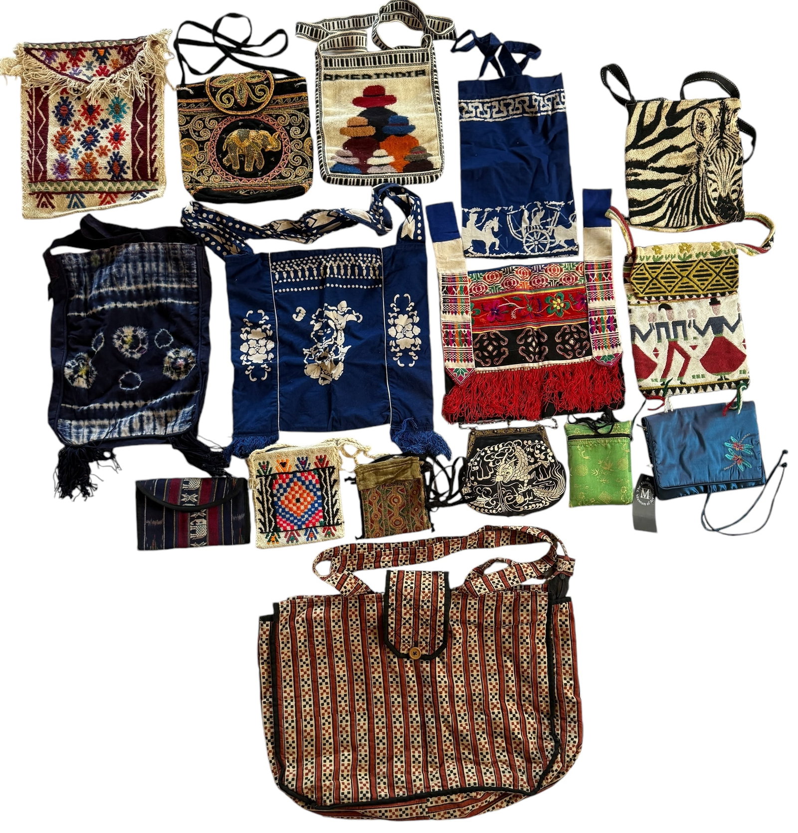 Group of Sixteen Vintage Purses Wallets Bags Ethnographic Embroidered +: From an upstate, NY estate. Group of sixteen vintage purses, wallets, and bags. Some Japanese shibori, tie die, art for wear, embroidered, etc. For specific measurements and condition report for each 