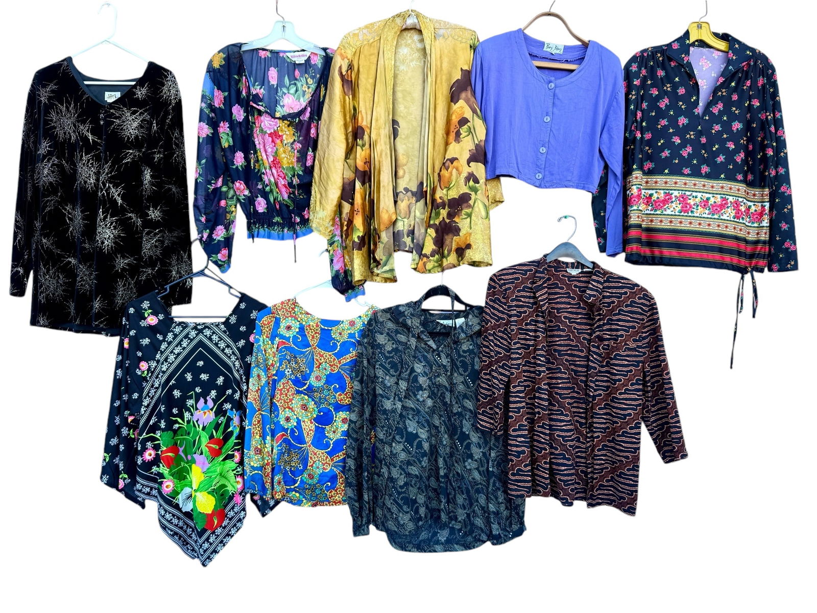 Group of Nine Women's Vintage Tops Shrugs Batik Silk +: From an upstate, NY estate. Group of nine vintage tops, shrugs and shirts including: untagged floral with waist drawstring sized approx L, Paris Blues cropped button down tagged S, batik top tagged Co