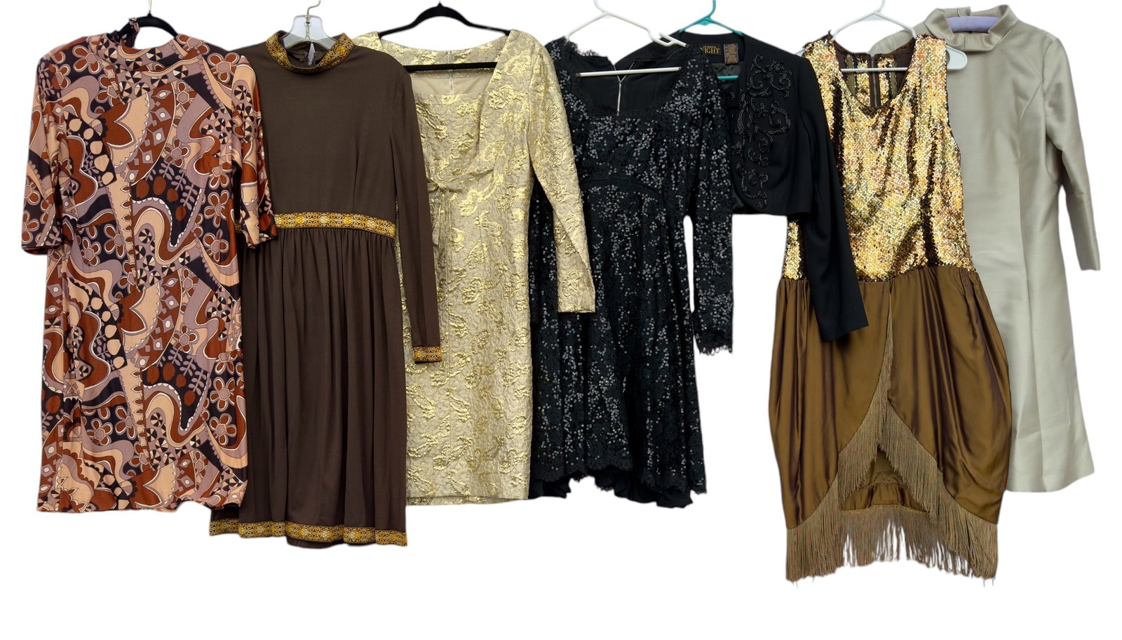 Group of Seven Vintage Women's Dresses & Bolero Sequins Beads Mod Patterns +: From an upstate, NY estate. Group of seven vintage dresses & pieces including: 1950s - 60s gold sequined and fringed dance dress (owned by a former cabaret performer) approx size M, black beade3d bole