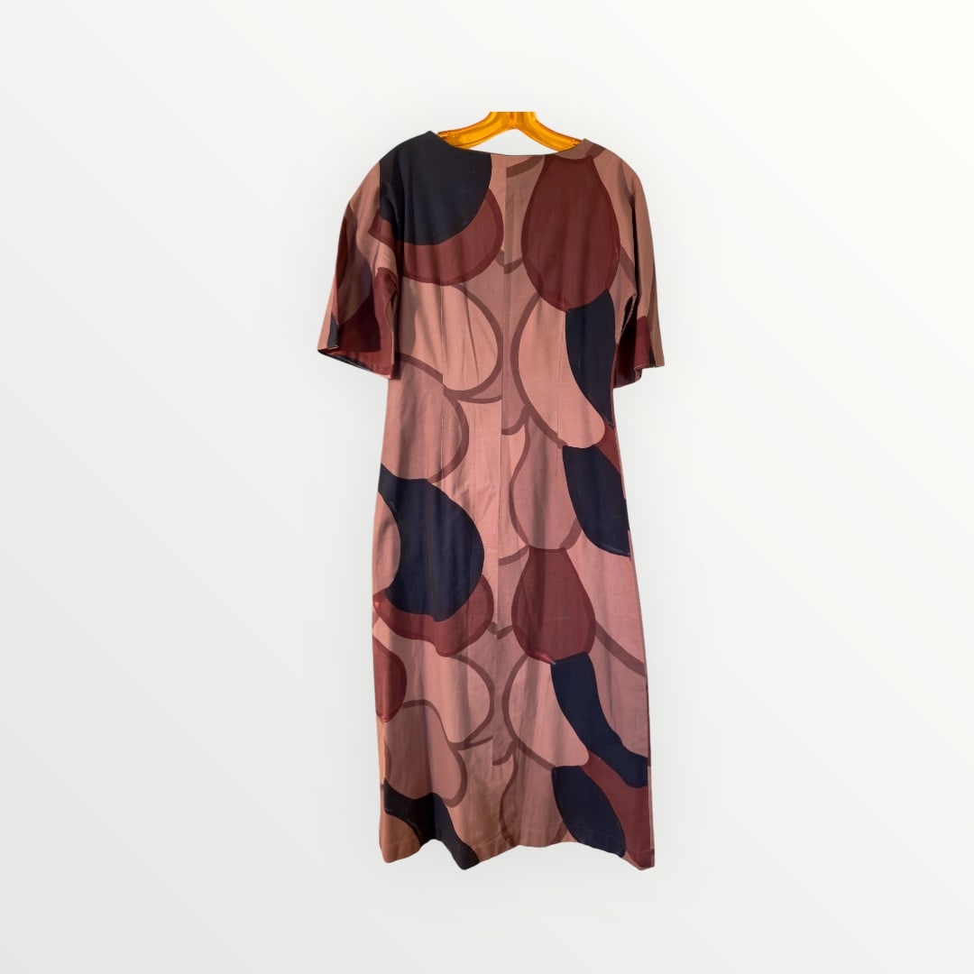 1960s Marimekko Fabric Mod Print Maxi Dress: From an upstate, NY estate. Mod print in browns and black maxi dress by Marimekko Suomi. Approx size M. Shoulder to hem: 52.5" Waist 33" Underarm circumference 38" Sleeve opening at shoulder circumfer