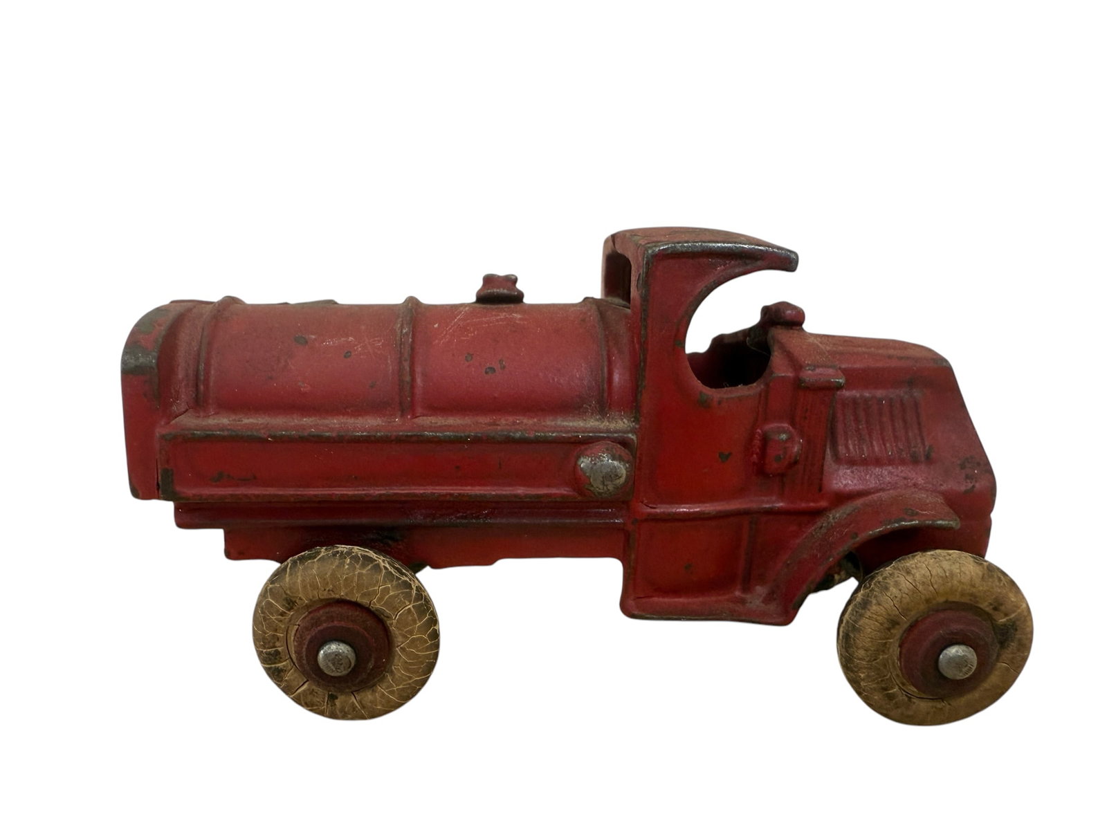 1930s Cast Iron Toy Oil Tanker Truck Red Paint Unmarked: From an upstate, NY estate collection. Red painted 1930s cast iron oil tanker truck. Unmarked. Measures approx 4.25" long by 2.25" tall.