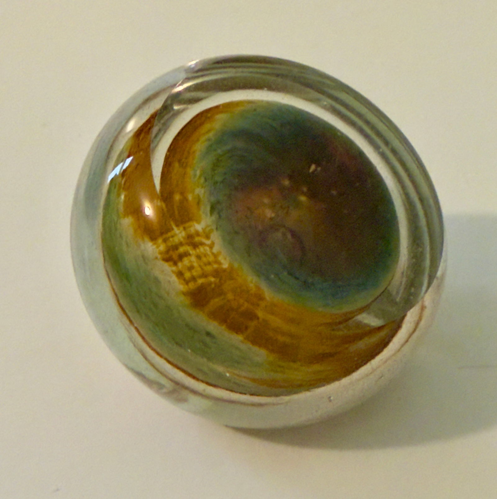 Galactic / Planetary Art Glass Paperweight by Kevin Gray Canadian: From an upstate, NY estate. Very dimensional galactic / planetary art glass paperweight by noted Canadian glass artist Kevin Gray. Acid etched signature, dated 1983. Measures approx 3" in diameter.