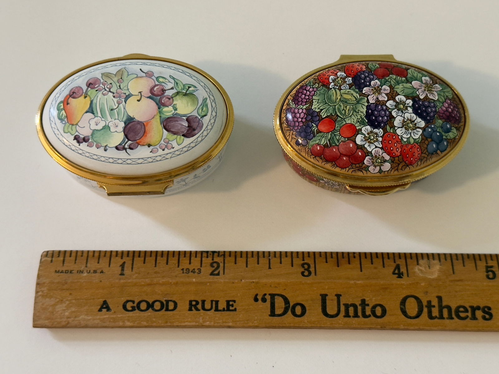 Pair of Porcelain Pill Boxes Enamel Staffordshire Enamels England: From an upstate, NY estate. Pair of limited edition porcelain enameled pill boxes, made by Staffordshire Enamels, England. Both have fruit decorations