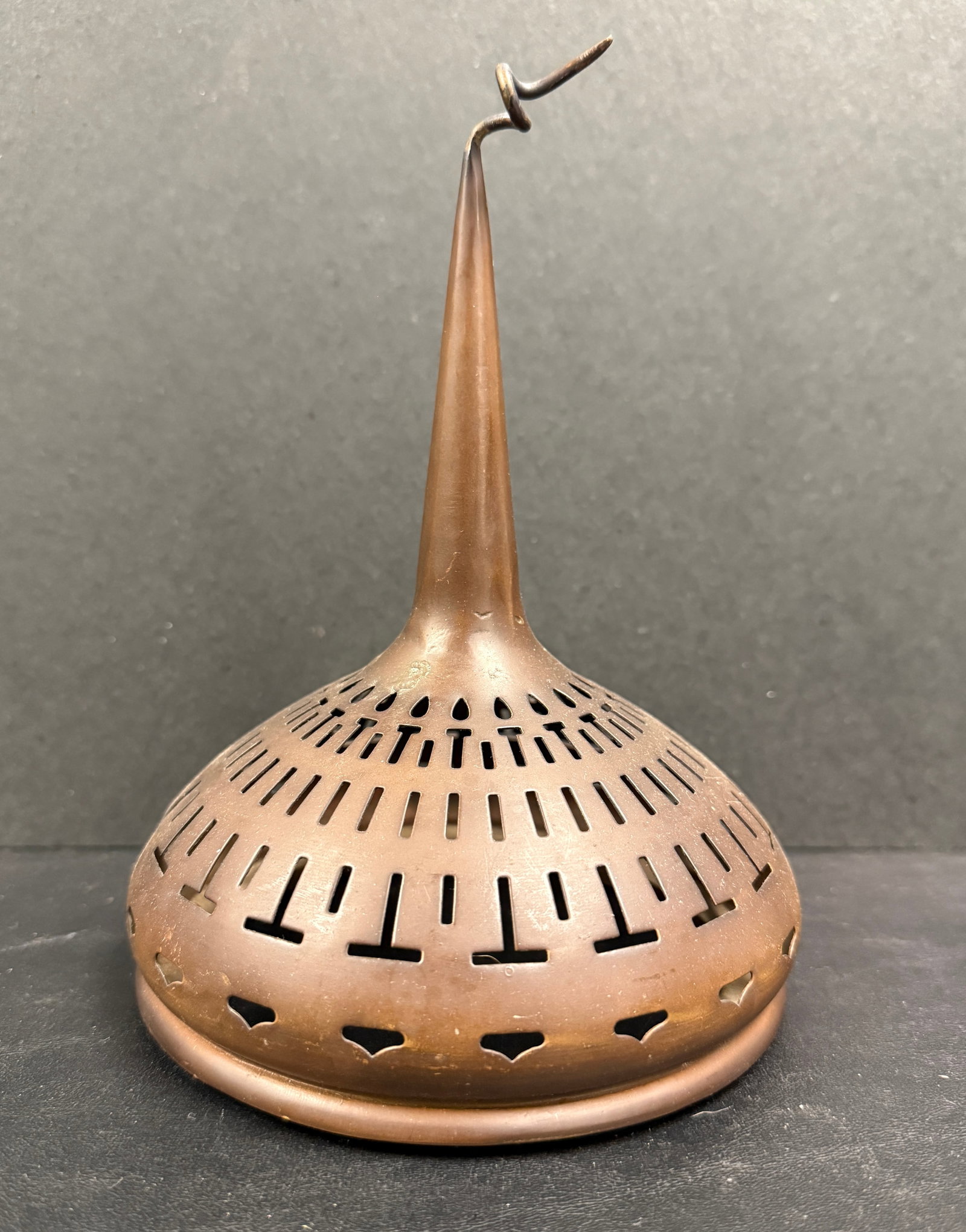 Manner of Tiffany Studios 'Pig Tail' Lamp Heat Cap: From an upstate, NY estate. In the manner of Tiffany Studios, bronze 'pig tail' heat cap for a stained-glass lamp. Unmarked. Measures approx 8" x 5.75" x 5.75". Interior fitter ring measures approx