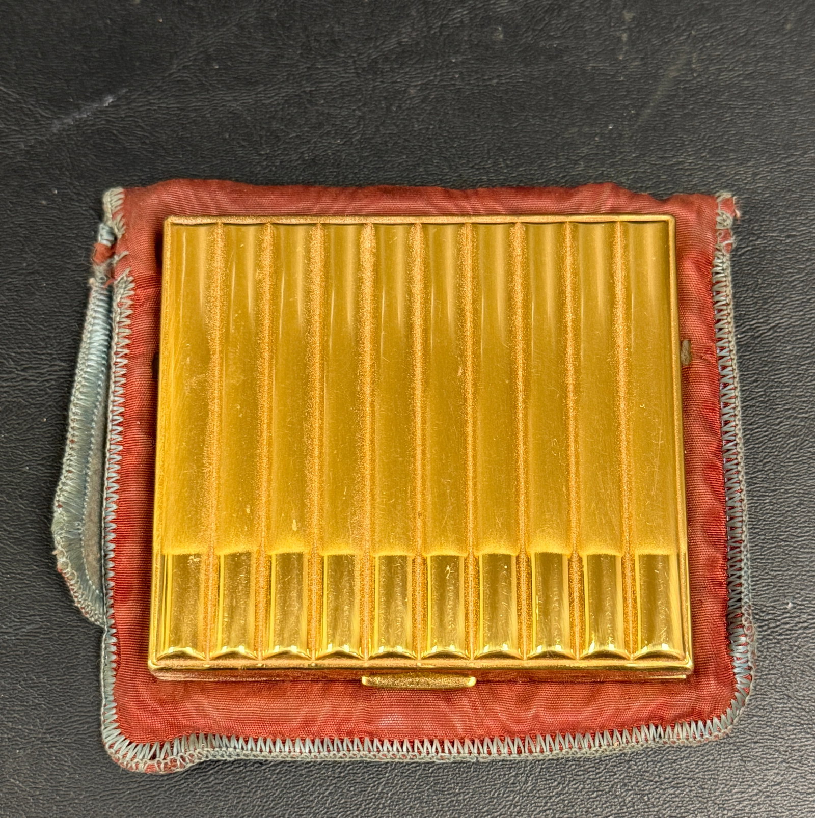 Vintage Art Deco Gold Tone Cigarette Case Glamourous: From an upstate, NY estate. Gold tone Art Deco cigarette case. Very nice condition. With felt pouch. Measures approx 3.375" x 3" x .75". Please see photos for details.