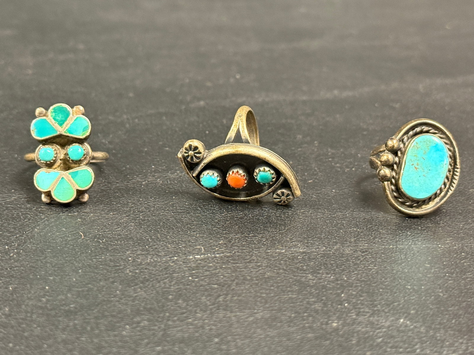 Group of 3 Native Sterling Silver Turquoise Rings: From an upstate, NY estate. Vintage group of three sterling silver Native American artisan rings with turquoise / carnelian. Total weight is 17 grams. Please see photos for details.
