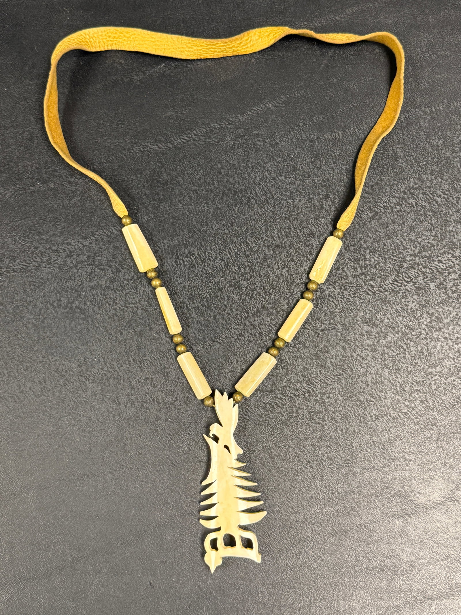 Native American Leather / Carved Bone Eagle Tree Necklace: From an upstate, NY estate. Beautiful Native American carved bone / leather necklace, with eagle and tree. Please see photos for details.