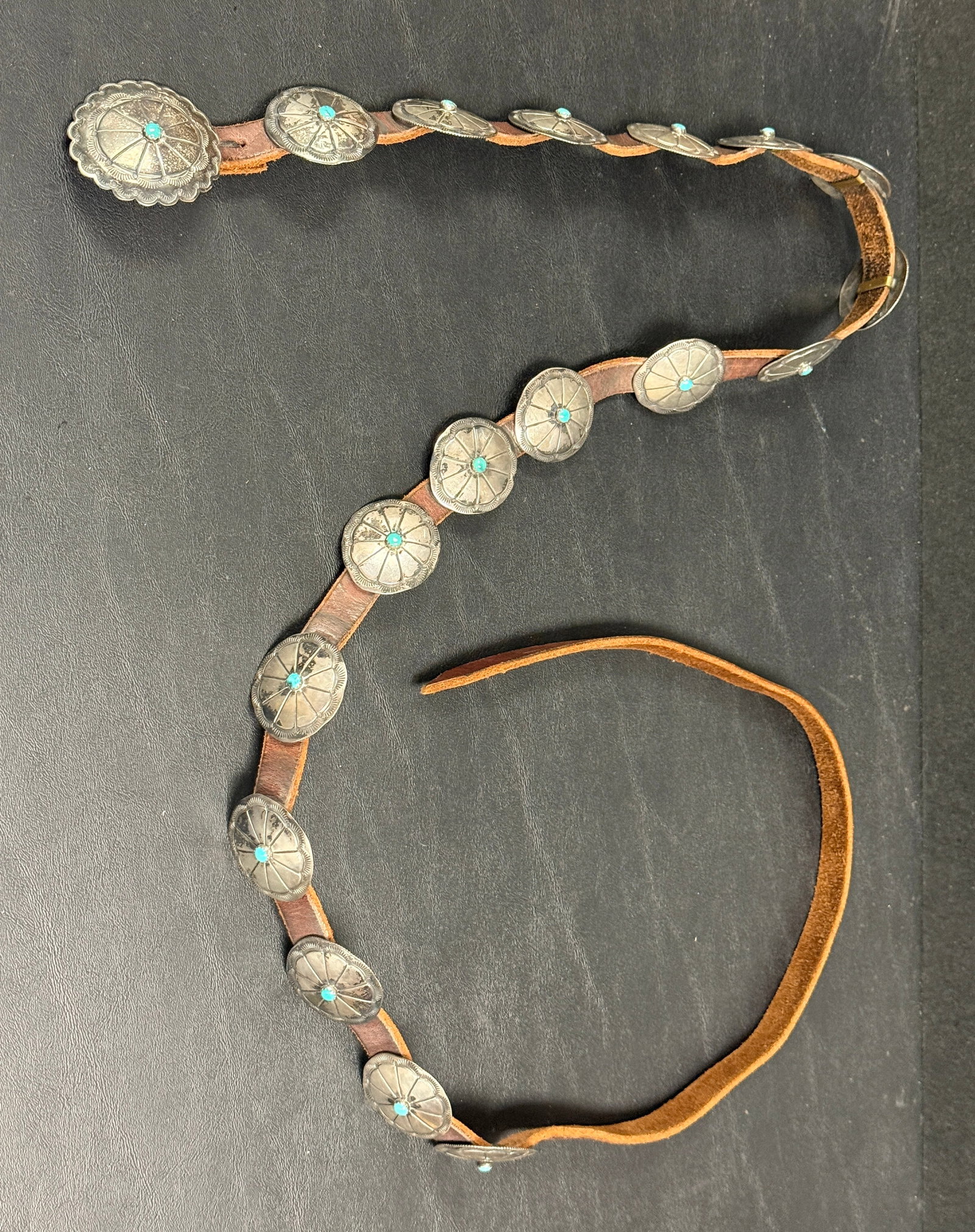 Native American Buffalo Dancer Coin Silver Turquoise Concho Belt: From an upstate, NY estate. Native American artisan coin silver concho belt with turquoise cabochons. Tested, signed Buffalo Dancer. Weighs approx 173 grams. Please see photos for details.