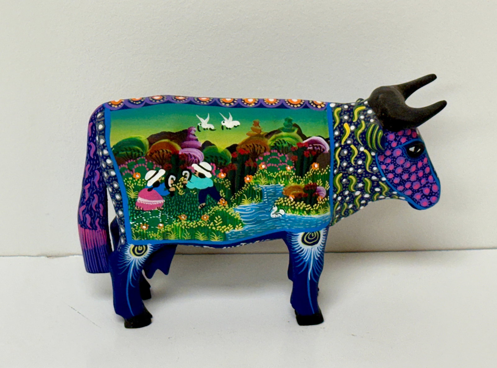 Felipe Benitez Miranda Folk Art Painted Cow Steer Arte Historia: From an upstate, NY estate. Wonderful carved and intricately painted wooden cow sculpture titled "Arte Historia" Signed on base, Felipe Benitez, Mexico. Measures approx 8.5" long x 5.75" tall (at horn