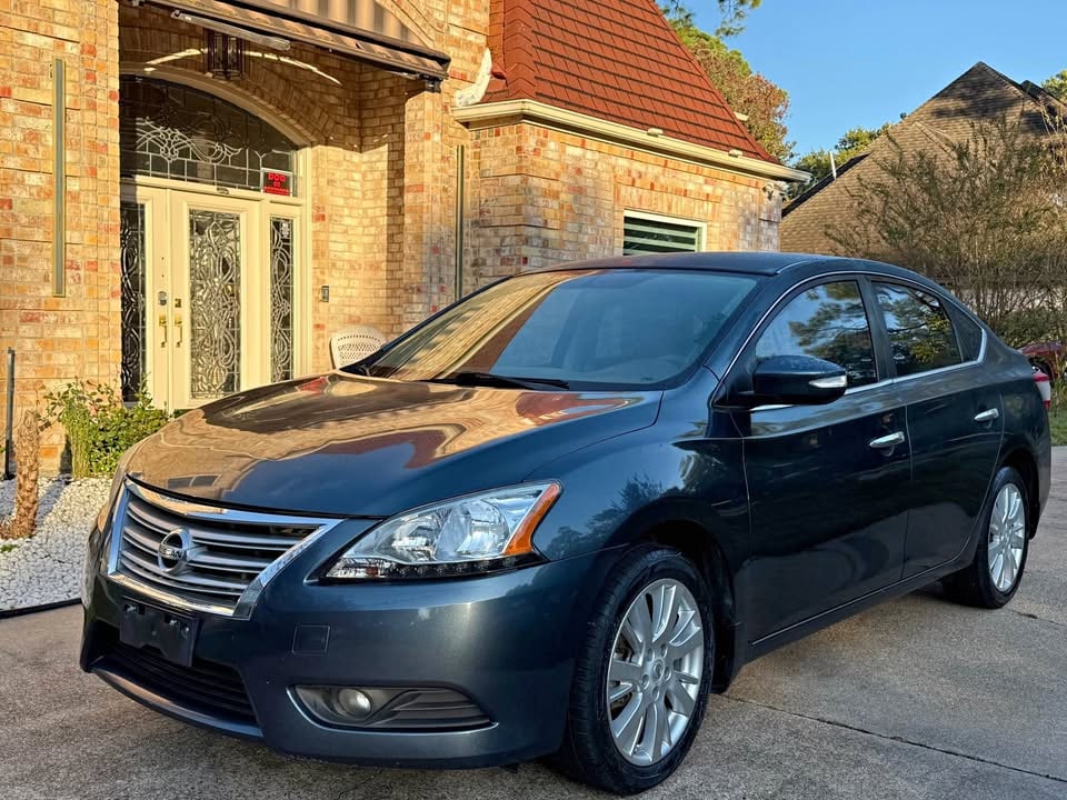 2014 Nissan sentra SL Sedan 4D: Driven 107,000 miles-Automatic transmission-Exterior color: Blue · Interior color: Tan-4/5 overall NHTSA safety rating-Fuel type: Gasoline30.0 MPG city · 39.0 MPG highway · 34.0 MPG com