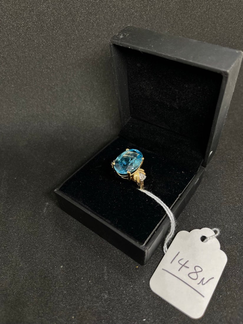 LADIES RING: BEAUTIFUL LADIES BLUE TOPZS RING 14K YELLOW GOLD WITH .10CTTW DIAMOND 8CT PLUS TOPAZ STONE SIZE8