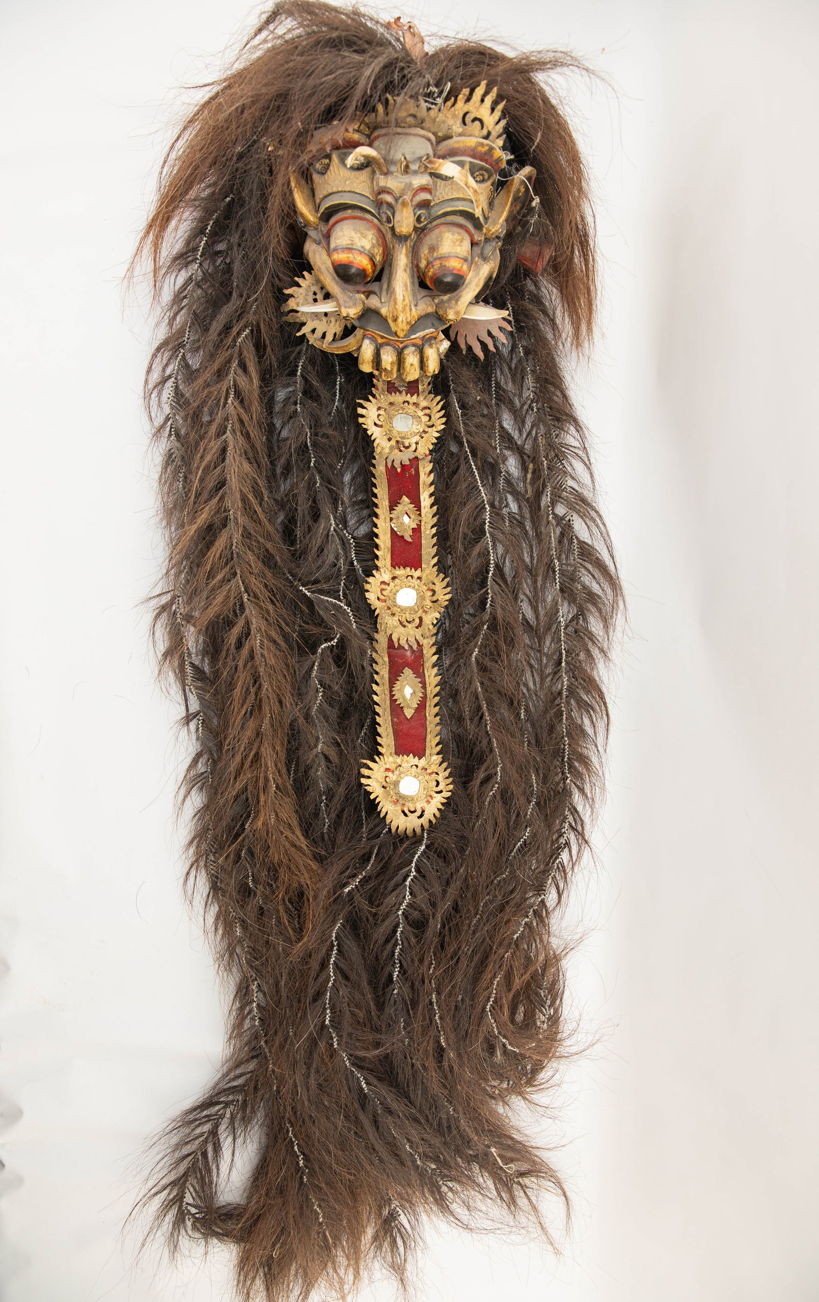 Rangda Balinese Barong Dance Mask: Rangda is the demon queen of the Leyaks in Bali, according to traditional Balinese mythology. Rangda leads an army of evil against the leader of good — Barong. The battle between Barong and Rangda i