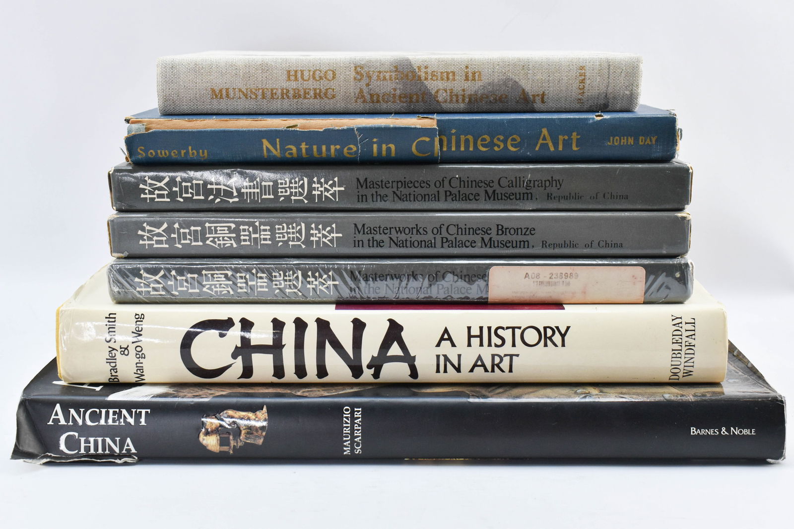 Seven Vintage Hardcover Chinese Art Books: Includes Masterpieces of Chinese Calligraphy in the National Palace Museum (1969), two copies of Masterworks of Chinese Bronze in the National Palace Museum (1969) (one unopened), Nature in Chinese Ar