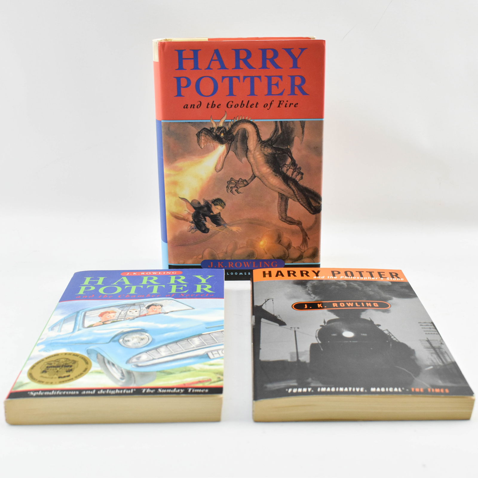 Three Early U.K. Harry Potter Editions: Includes a hardcover Bloomsbury edition of Harry Potter and the Goblet of Fire printed in 2000, a softcover Bloomsbury edition of Harry Potter and the Chamber of Secrets printed in 1998, and a softcov